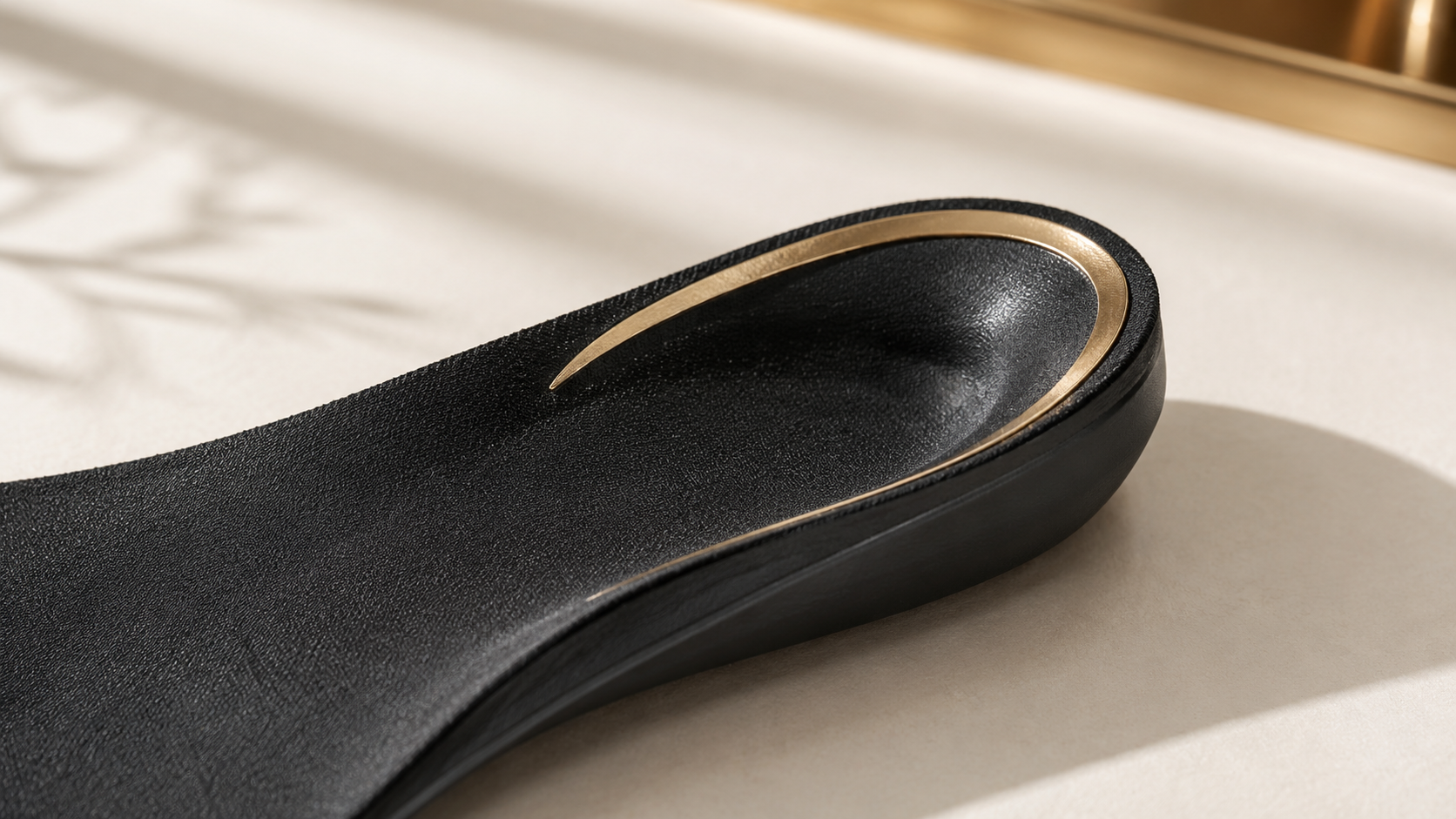 Shock absorbing heel cup in plantar fasciitis insole